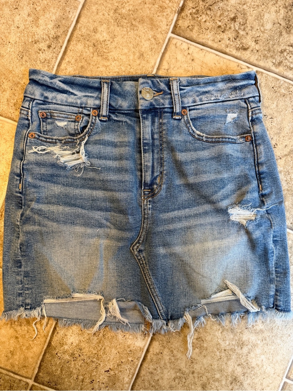 American Eagle Outfitters Light Blue Distressed Denim Mini Skirt